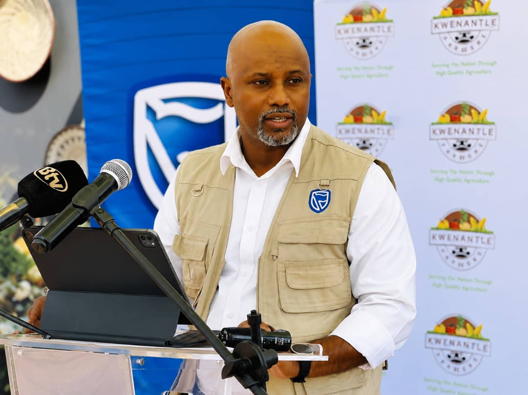 Lesego Osman speaking at a community-focused event